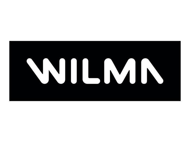 Logo mit dem Schriftzug &bdquo;WILMA&ldquo; auf schwarzem Hintergrund in stilisierter Schriftart.